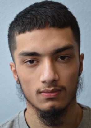 Custody photo of Al-Arfat Hassan