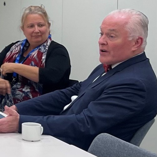 Colleagues and the HMCPSi Chief Inspector discussing some of the criminal justice challenges