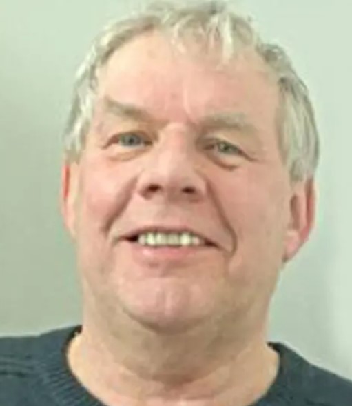 Custody image of Roger Pilling, a middle aged man with grey hair