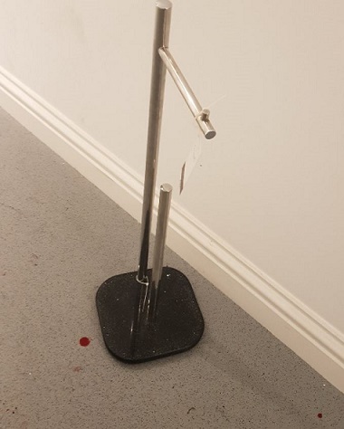 The toilet roll holder used to assault the officer