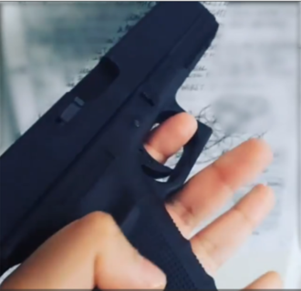 Mohiussunnath Chowdhury posing with replica gun in Instagram video which he posted. Credit: Metropolitan Police