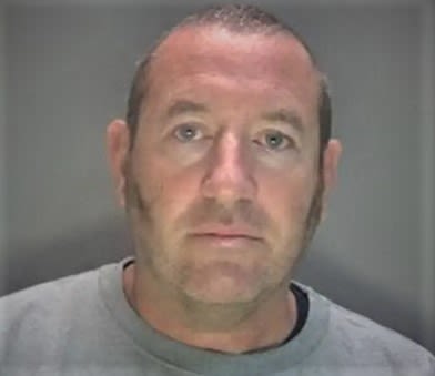 Police custody photo of David Carrick