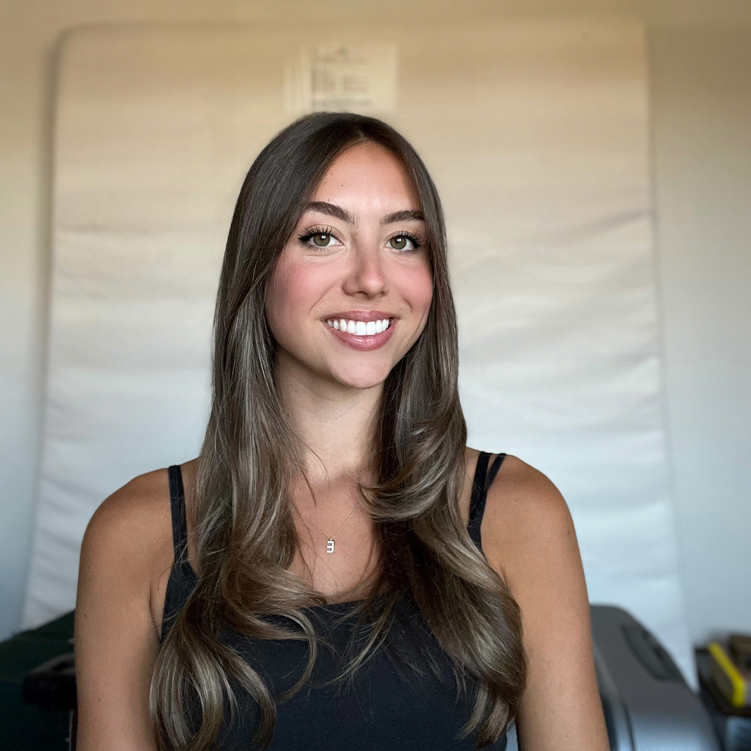 Photo of CPS employee, long brunette hair and wearing a black.