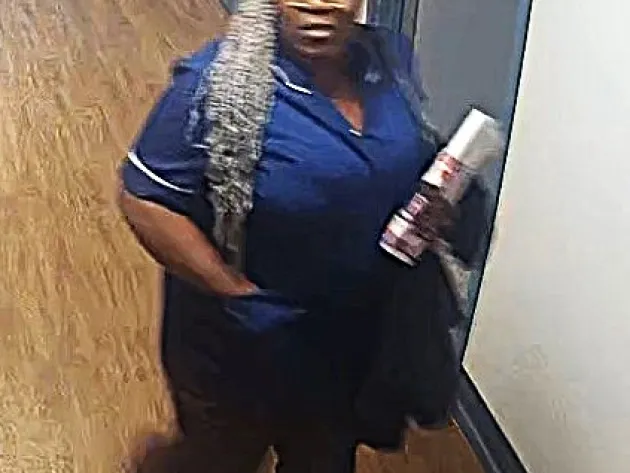 Laurence Tchapong walking in corridor