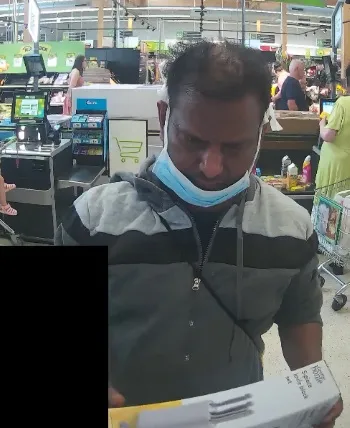 A supermarket checkout camera captures Nimalarajah Mathiyadaranam buying murder weapon
