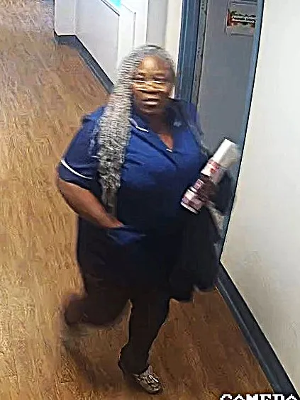 Laurence Tchapong walking in corridor