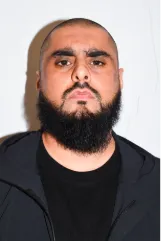 Mohammad Bashir, a man with a large beard and bald head